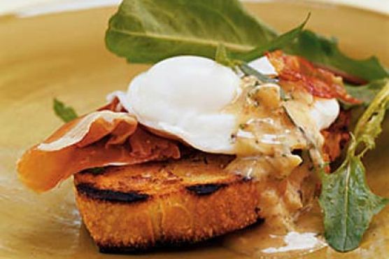 Breakfast Bruschetta with Prosciutto, Poached Eggs, and Warm Mustard Vinaigrette