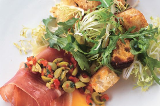 Eggs with Serrano Ham and Manchego Cheese, Green Olive Relish, and Migas