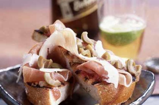 Grilled Bread with Serrano Ham, Manchego, and Olives
