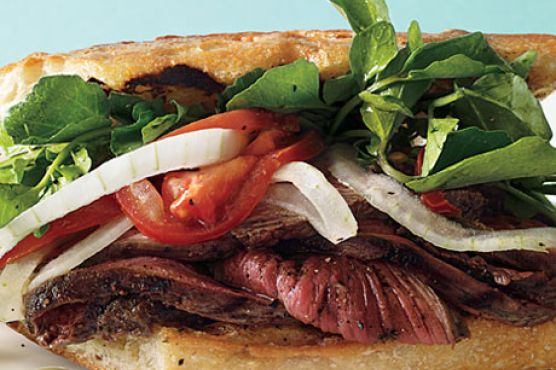 Grilled Steak Sandwiches with Marinated Watercress, Onion, and Tomato Salad