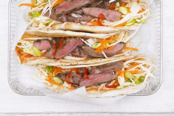 Hot cumin lamb wrap with crunchy slaw & spicy mayo