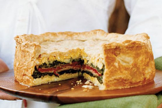 Layered Torta with Ham, Provolone, Spinach, and Herbs