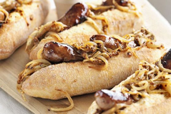 Maple-glazed hot dogs with mustardy onions