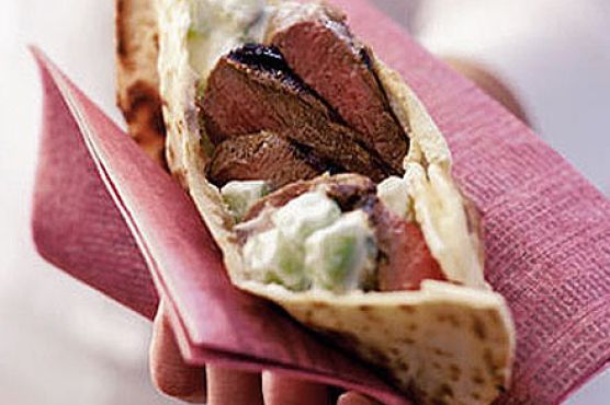 Marinated lamb steaks in flat bread