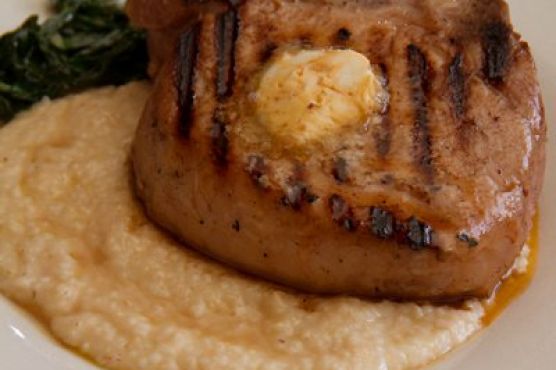 Mess Hall’s Hog Chop with Cheddar Grits and Tabasco Butter