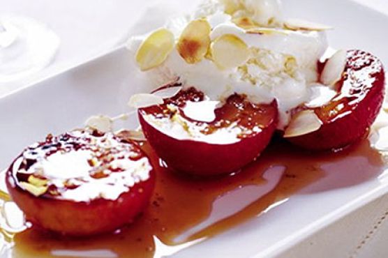Peppered plums with almond ice