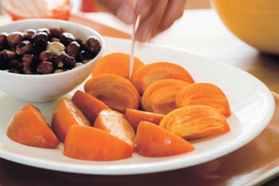 Persimmon Wedges with Toasted Hazelnuts