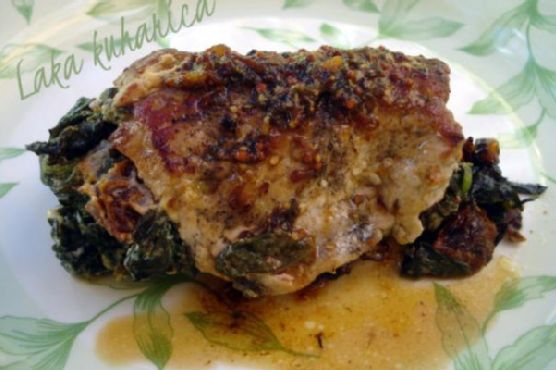 Pork chops stuffed with tomatoes and spinach