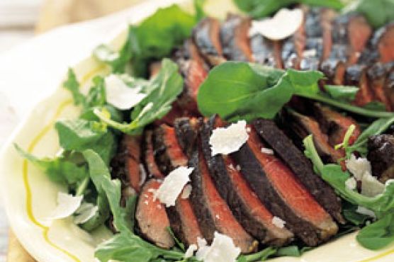 Porterhouse Steaks with Arugula and Parmesan Cheese