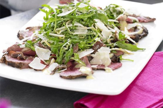 Rare beef & anchovy salad with rocket & Caesar dressing