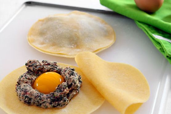 Raviolo with Egg Yolk in Truffle Scented Sage Brown Butter Sauce