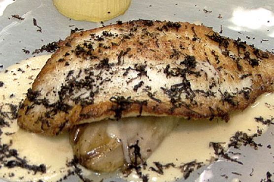 Sauteed Turbot with Braised Endive, Celery Root Flan, Black Truffles, and Garlic Nage