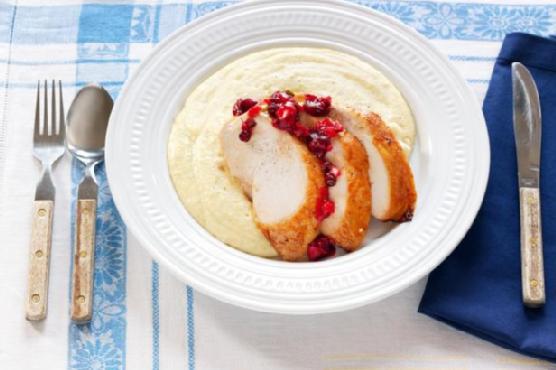 Sliced Chipotle Turkey Breast With Pomegranate Cranberry Relish and Polenta