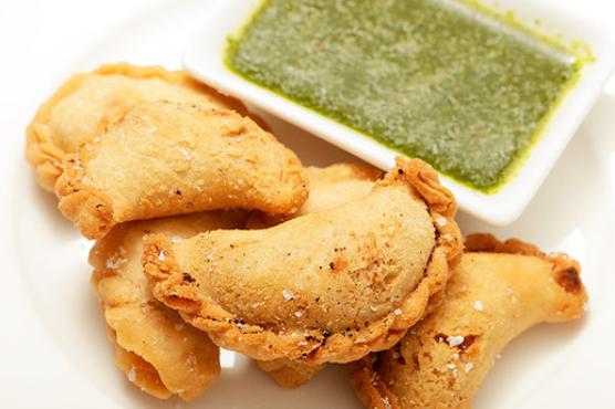 Smoky Potato and Caper Empanadas with Cilantro Sauce